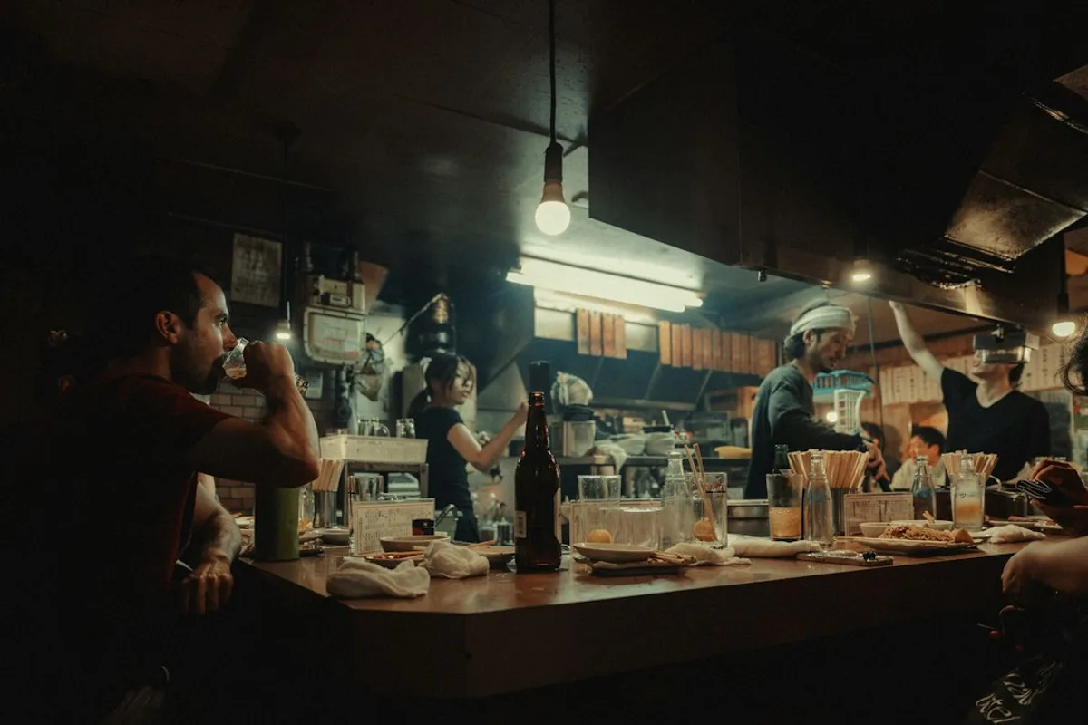 A dimly lit cocktail bar interior in Gion, Kyoto