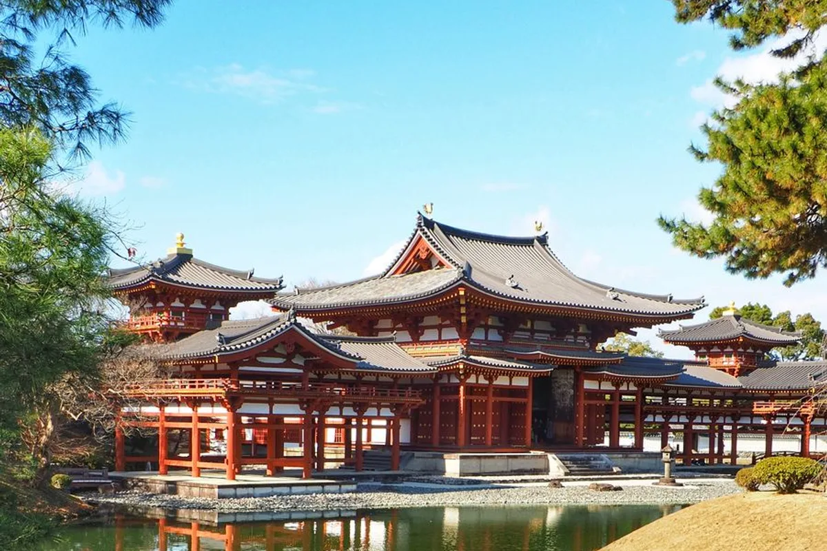 The Phoenix Hall of Byodo-in Temple reflected in its pond in Uji